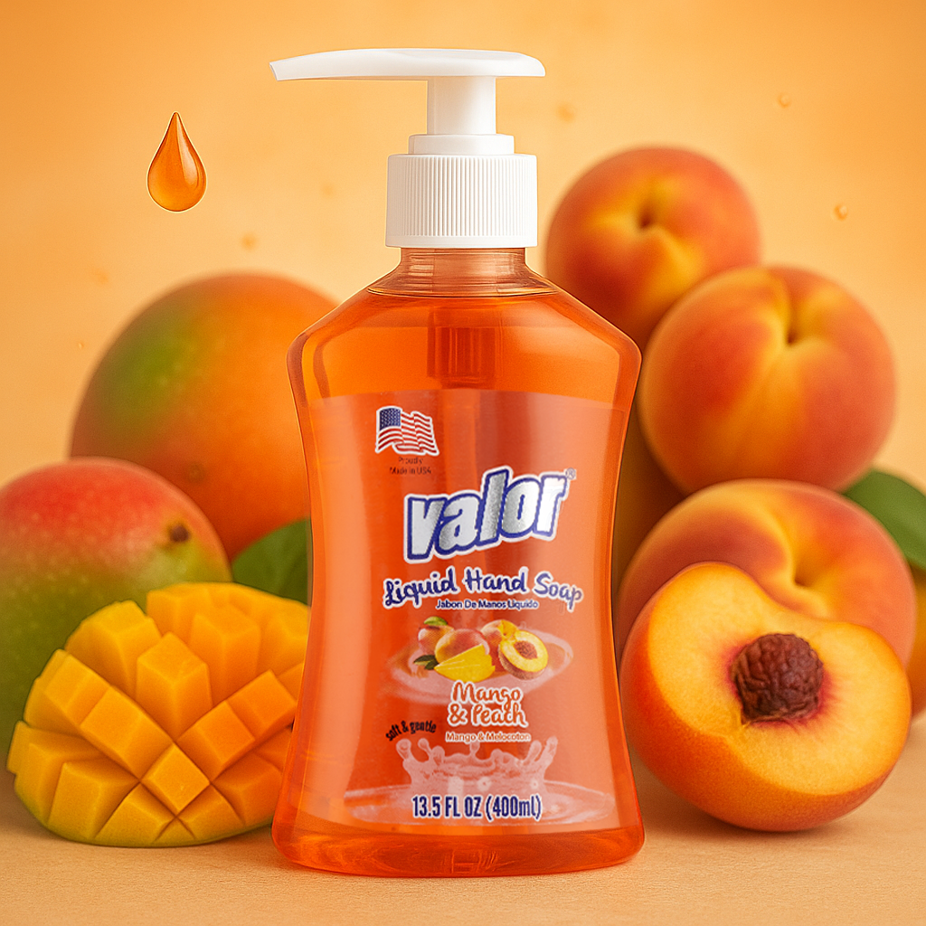 VALOR Liquid Hand Soap in Mango & Peach fragrance, surrounded by fresh mangoes and peaches, perfect for vibrant handwashing.